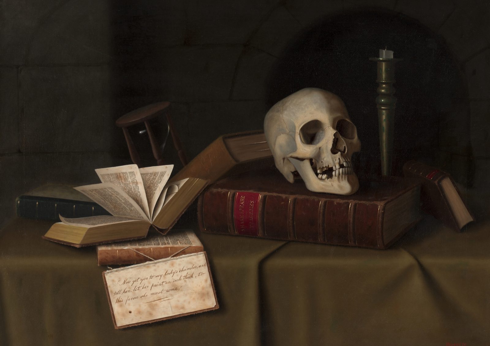 Memento Mori, To This Favour by William Michael Harnett, 1879. A human skull rests on top of a worn leather volume of Shakespeare's tragedies among old books on a dark table.