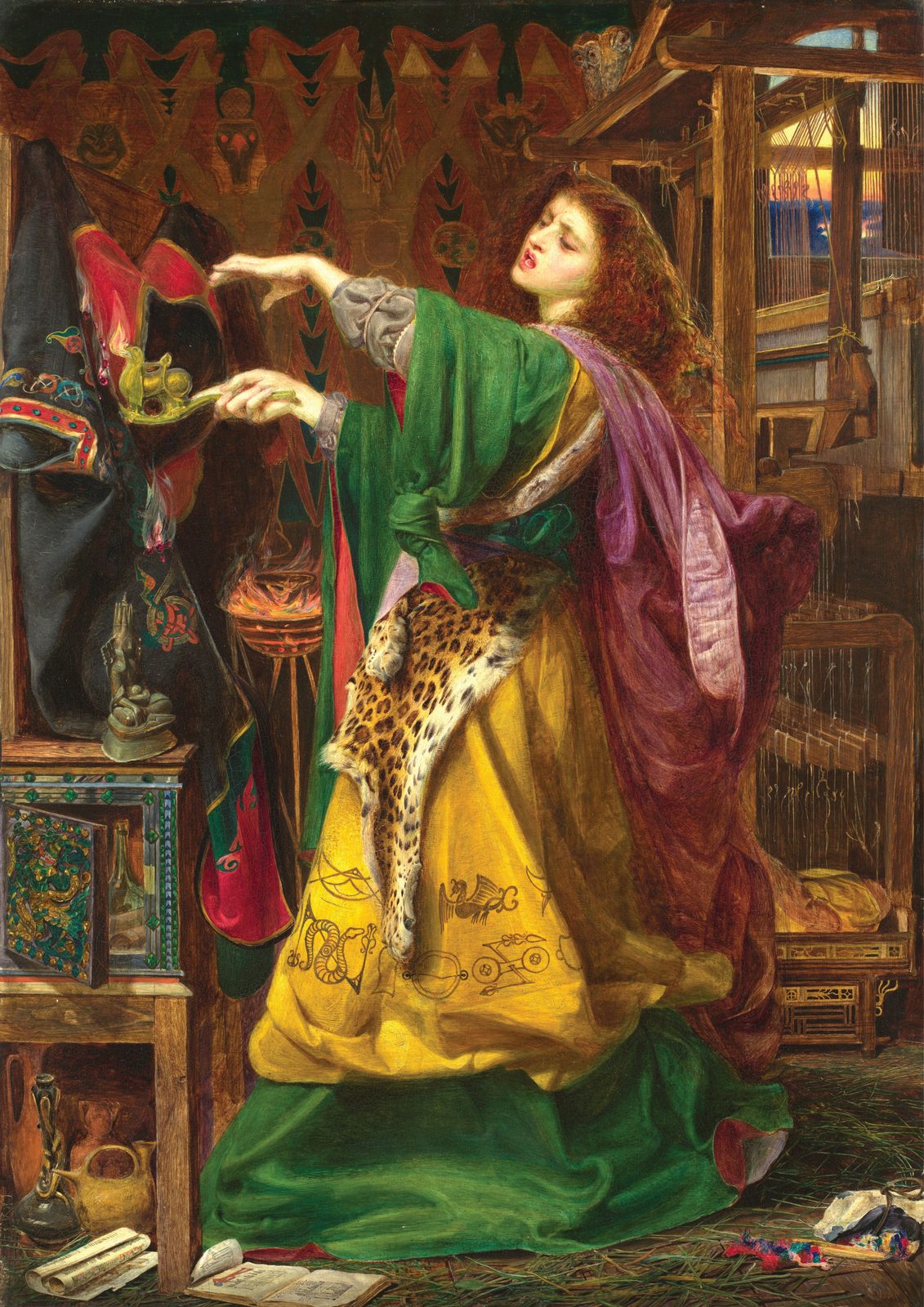Morgan le Fay by Frederick Sandys, 1864. A red-haired sorceress in a leopard skin and green robe stands at her loom, holding a woven cloak, beside a burning lamp and a book of spells.