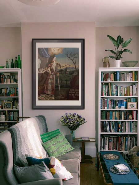 Allegory of Death by Tomás Mondragón as a framed print in a living room