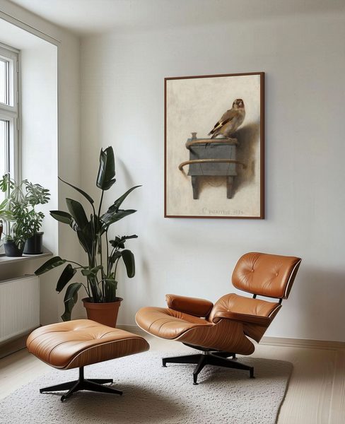 The Goldfinch by Carel Fabritius as a framed print in a living room