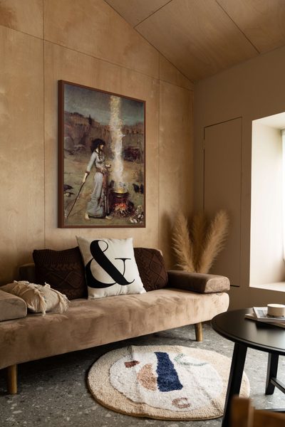 The Magic Circle by John William Waterhouse as a framed print in a living room